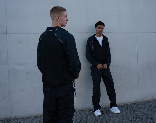 Two Model show how to Style Vintage Nike Trackpants in Streetwear Optic.